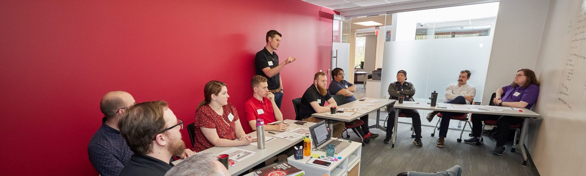 Employees around a conference table