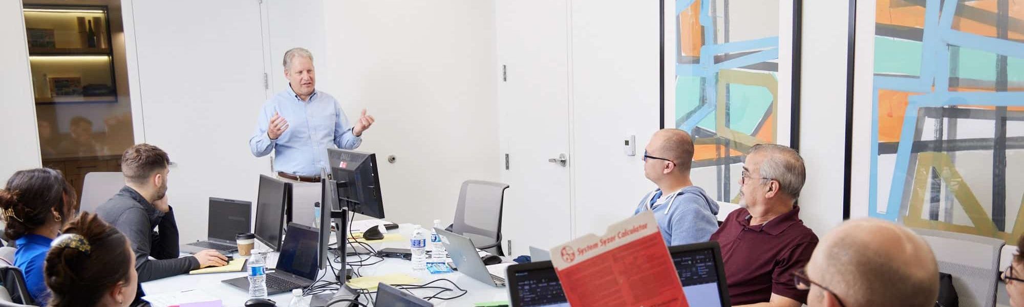 Employees meeting around a conference table