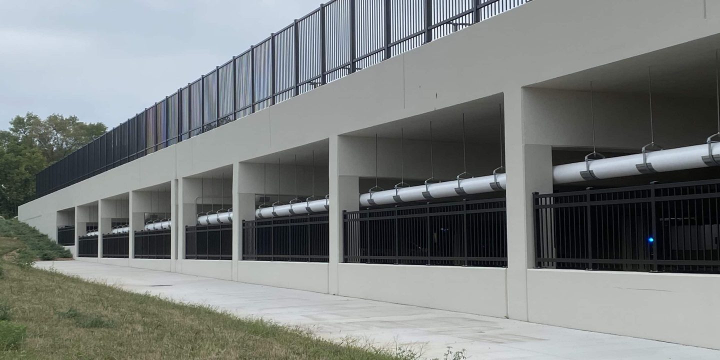 Fences and pipe structure at parking garage