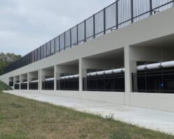 Fences and pipe structure at parking garage