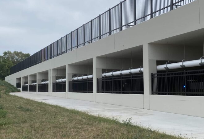 Fences and pipe structure at parking garage