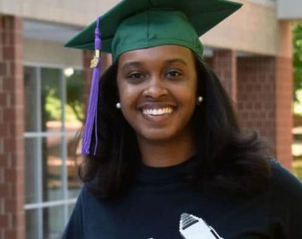 Headshot of Aleah Pullen in a graduation cap