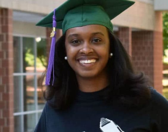 Headshot of Aleah Pullen in a graduation cap