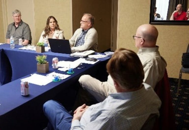 Group of people around conference table