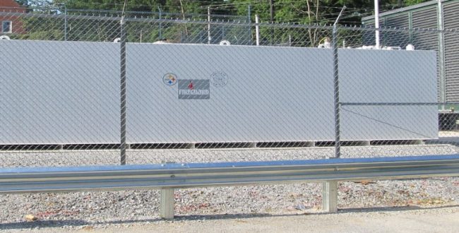 Emergency generators behind fence